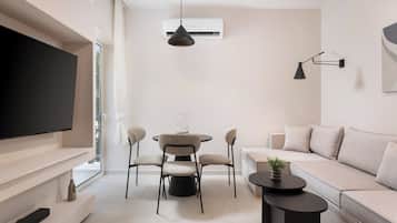 Glyfada Prime Apartment | Living room | 50-inch Smart TV with satellite channels, Netflix, streaming services