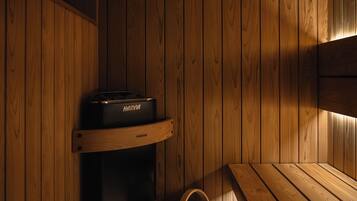 Hair dryer, towels, shampoo, toilet paper