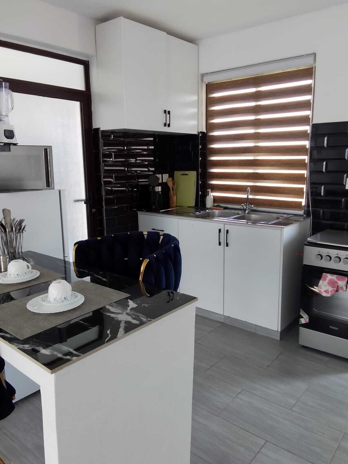 Fridge, microwave, high chair