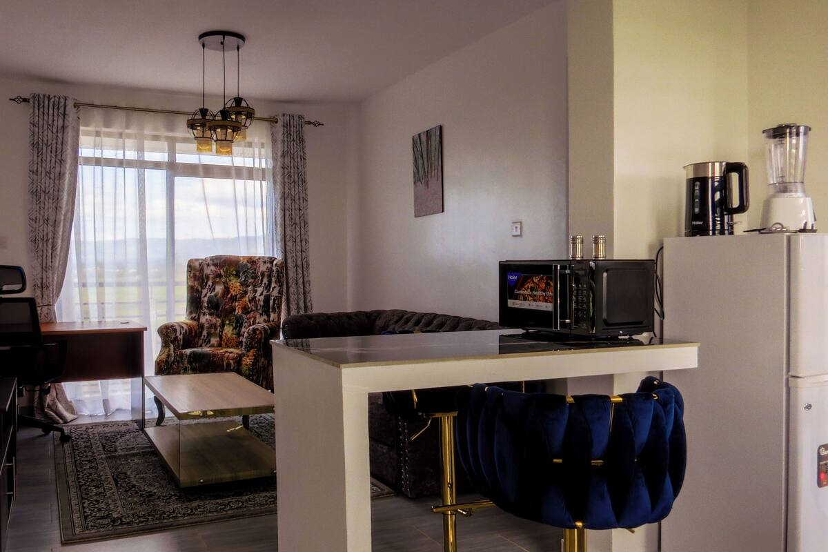 Comfort Apartment, 1 Bedroom, Balcony, Mountain View | Minibar, in-room safe, blackout drapes, iron/ironing board (on request)
