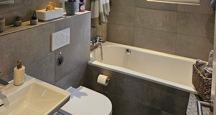 Elya Apartment – Garden Retreat Near Events, Outlet & Spa