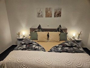 1 slaapkamer, een strijkplank/strijkijzer, wifi, beddengoed