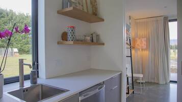 Coffee/tea maker, fridge, toaster, cookware/dishes/utensils