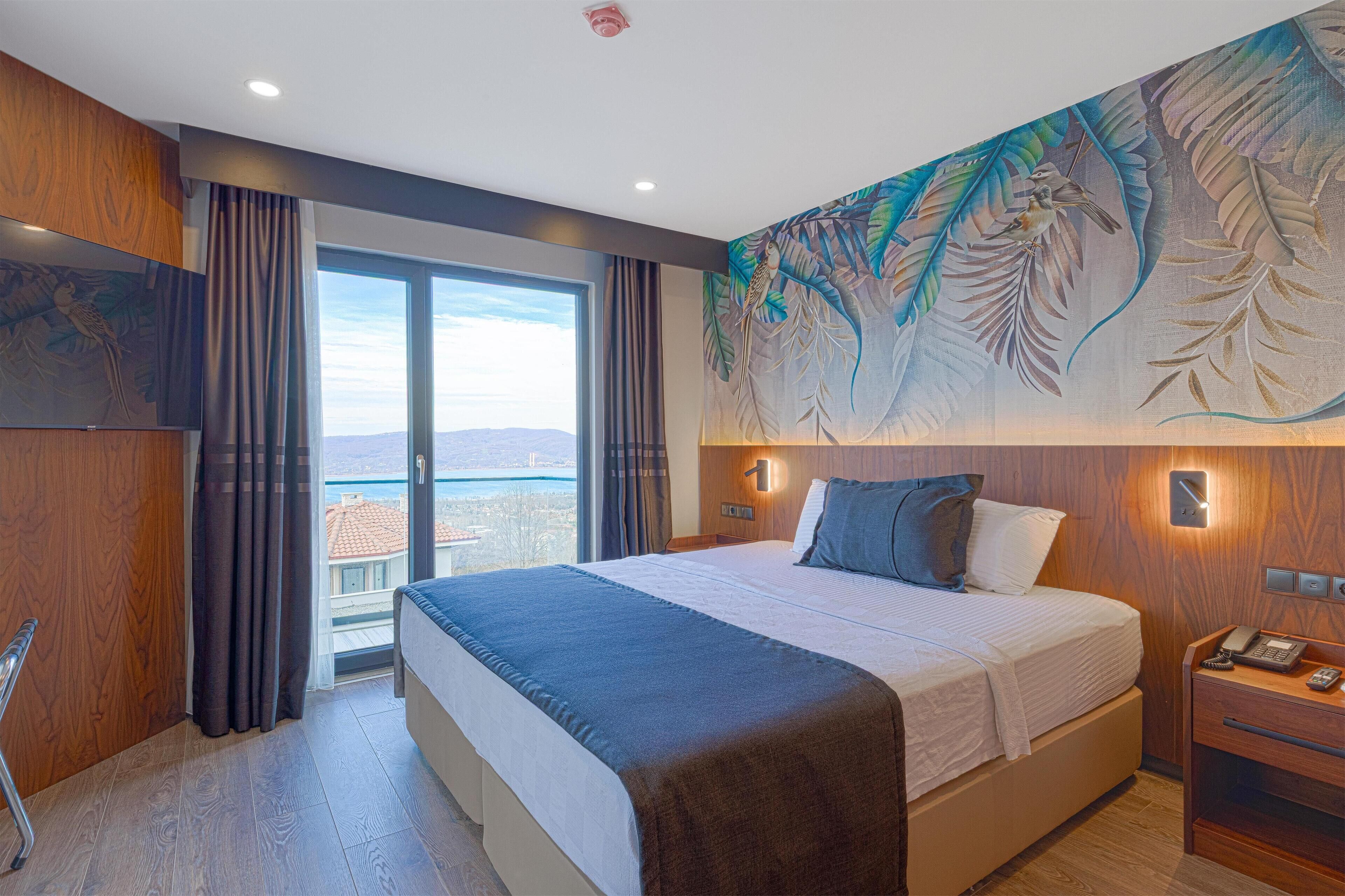 Chambre Deluxe, 1 très grand lit, non-fumeurs, vue lac | Literie hypoallergénique, couette en duvet d'oie