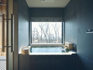 A modern bathroom with a large window, a bathtub, and a wooden stool. - SANU 2nd Home Nasu 3rd (Nasu)