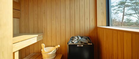 Hair dryer, towels, shampoo, toilet paper