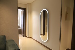 Executive Suite, City View | Living area | 55-inch Smart TV with cable channels, Netflix, smart speakers - Seasons hotel suites (Al Kharj)
