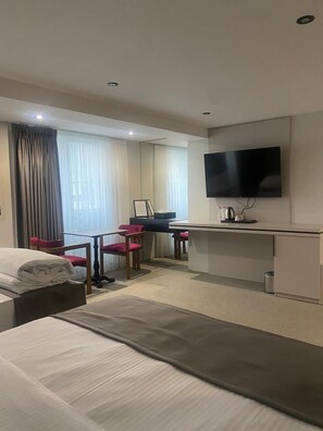 Family Apartment, City View | Desk, laptop workspace, blackout drapes, iron/ironing board - Adler Hotel (Prizren)