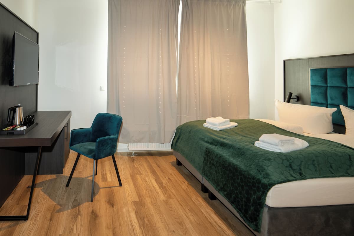 Desk, free WiFi, bed sheets