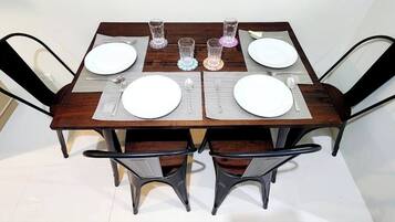 Room, 1 Bedroom, Balcony | Dining room