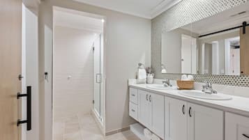 Shower, hair dryer, towels, shampoo