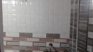 Family Room | Bathroom | Shower, designer toiletries, soap, shampoo