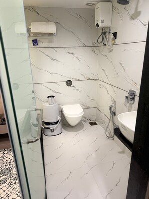 Shower, free toiletries, towels, soap