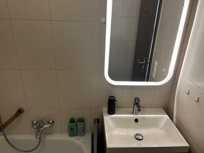 Hair dryer, towels, soap, toilet paper