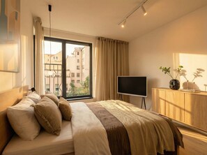 2 habitaciones, tabla de planchar con plancha, cuna de viaje y wifi 