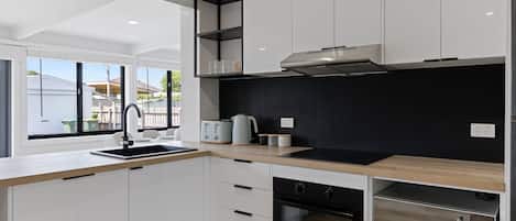 Fridge, microwave, dishwasher, coffee/tea maker