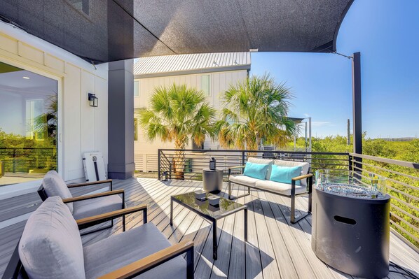 A modern outdoor deck with a sofa, chairs, and a table. - Walk to Dtwn Shops & Eats: St Augustine Haven! (St. Augustine)