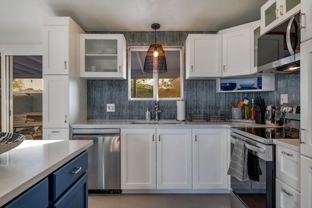 Fridge, microwave, oven, stovetop. Stylish / Carport / 3 BR 2 BA / Big Yard / Grill