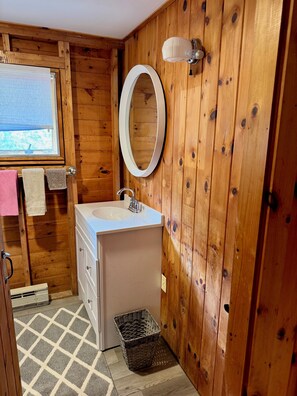 Shower, towels, soap, toilet paper