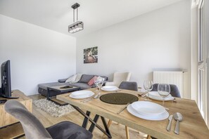 Appartement Deluxe, balcon, vue jardin | Salle de séjour