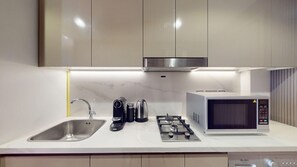 Fridge, microwave, coffee/tea maker, toaster