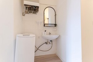 Shower, hair dryer, soap, shampoo