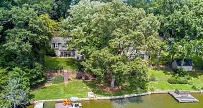 Experience Serenity on Broadway Lake in this beautiful 3 bedroom home