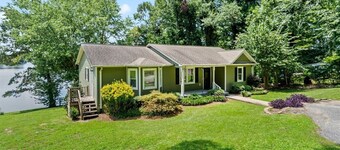 Experience Serenity on Broadway Lake in this beautiful 3 bedroom home