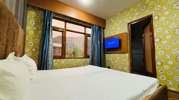 Deluxe Double Room, Patio, Mountain View | Desk, laptop workspace, iron/ironing board, free WiFi