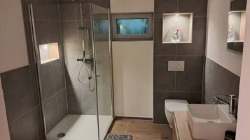 Shower, free toiletries, hair dryer, towels