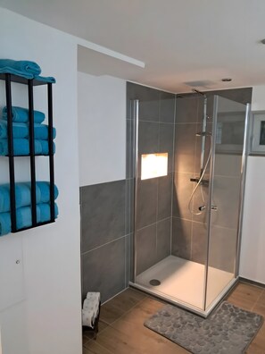 Shower, free toiletries, hair dryer, towels