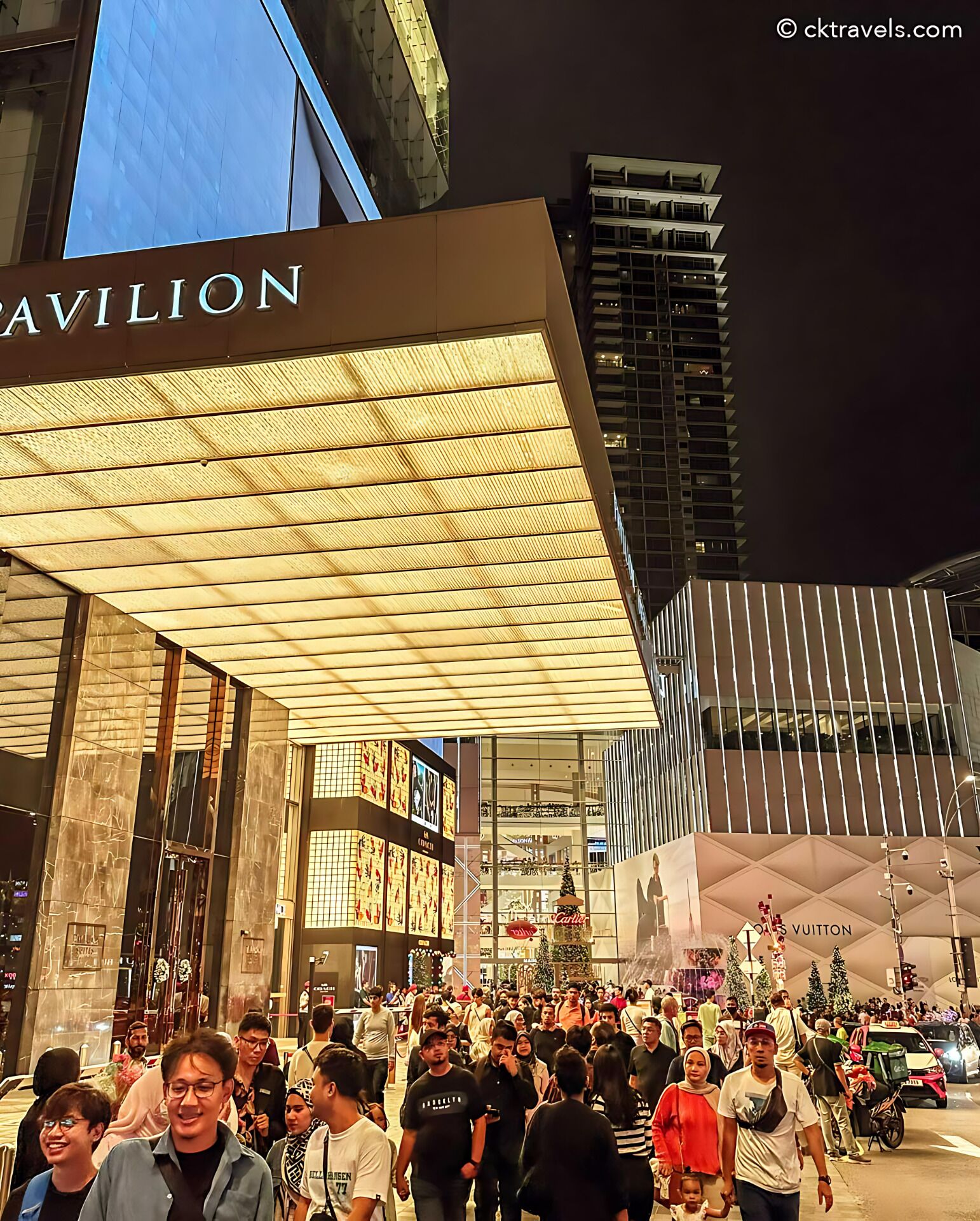 A busy urban area with a prominent building labeled "PAVILION".