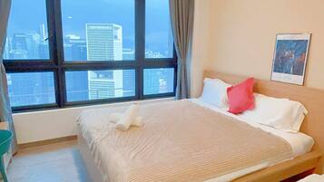 Deluxe Apartment, City View | Free minibar, blackout curtains, soundproofing, iron/ironing board