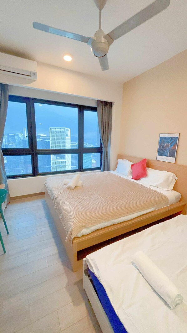 Deluxe Apartment, City View | Free minibar, blackout drapes, soundproofing, iron/ironing board - Golden New Nest Inn Agile TRX Luxury Condo in Bukit Bintang (Kuala Lumpur)