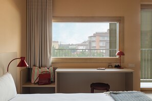 Premium bedding, down comforters, in-room safe, desk