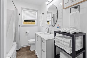 Hair dryer, towels, soap, toilet paper