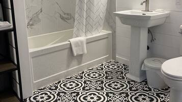 Hair dryer, towels, soap, toilet paper