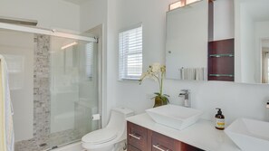 Hair dryer, towels, soap, shampoo