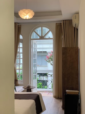 Deluxe Double Room, City View | Minibar, blackout curtains, free cots/infant beds, rollaway beds