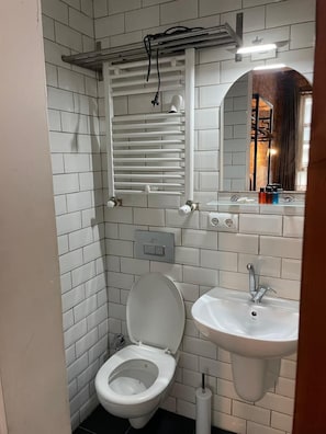 Apartment | Bathroom | Free toiletries, hair dryer, slippers, soap