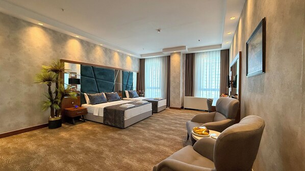 Executive Twin Room, City View | In-room safe, desk, laptop workspace, blackout drapes