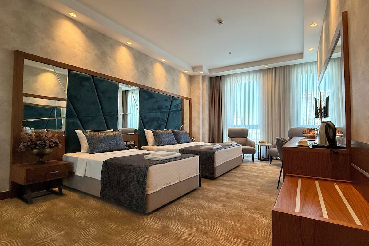 Standard Double Room, City View | In-room safe, desk, laptop workspace, blackout drapes