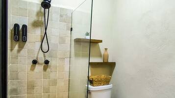 Shower, towels, soap, toilet paper