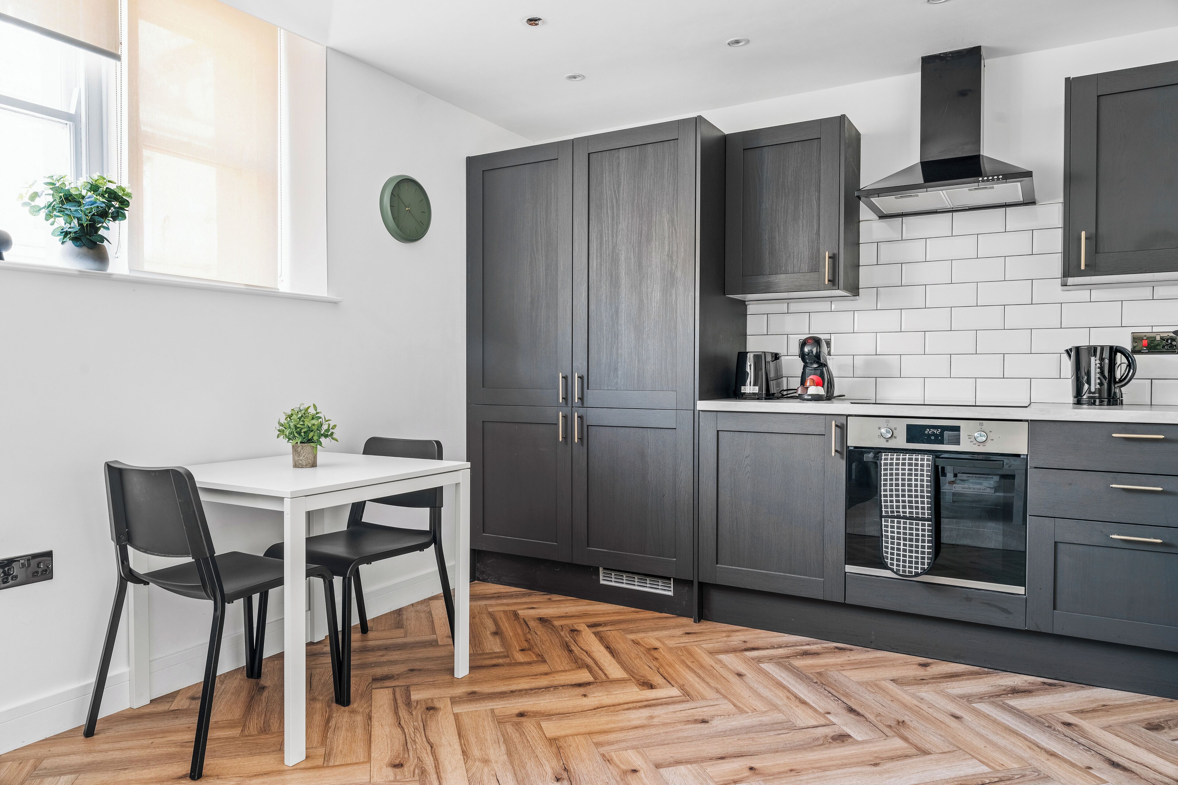 Comfort Apartment | Private kitchen | Full-size fridge, microwave, oven, stovetop