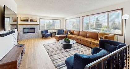 Spacious home w/ game room, private hot tub, mountain views, & bbq grill