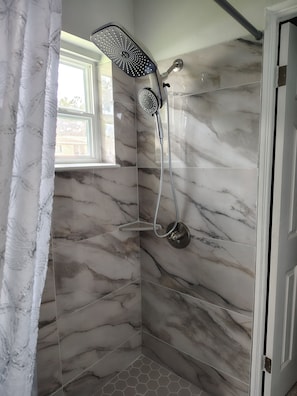 Shower, hair dryer, towels, soap