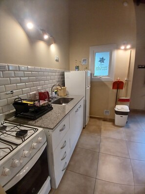 Apartment, 1 Bedroom, Kitchen, Courtyard View | Private kitchen | Full-sized fridge, oven, stovetop, cookware/dishes/utensils