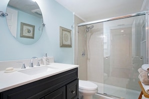 Shower, hair dryer, towels, soap