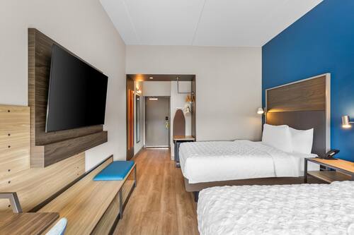 Room, 2 Queen Beds | Desk, laptop workspace, free WiFi, bed sheets