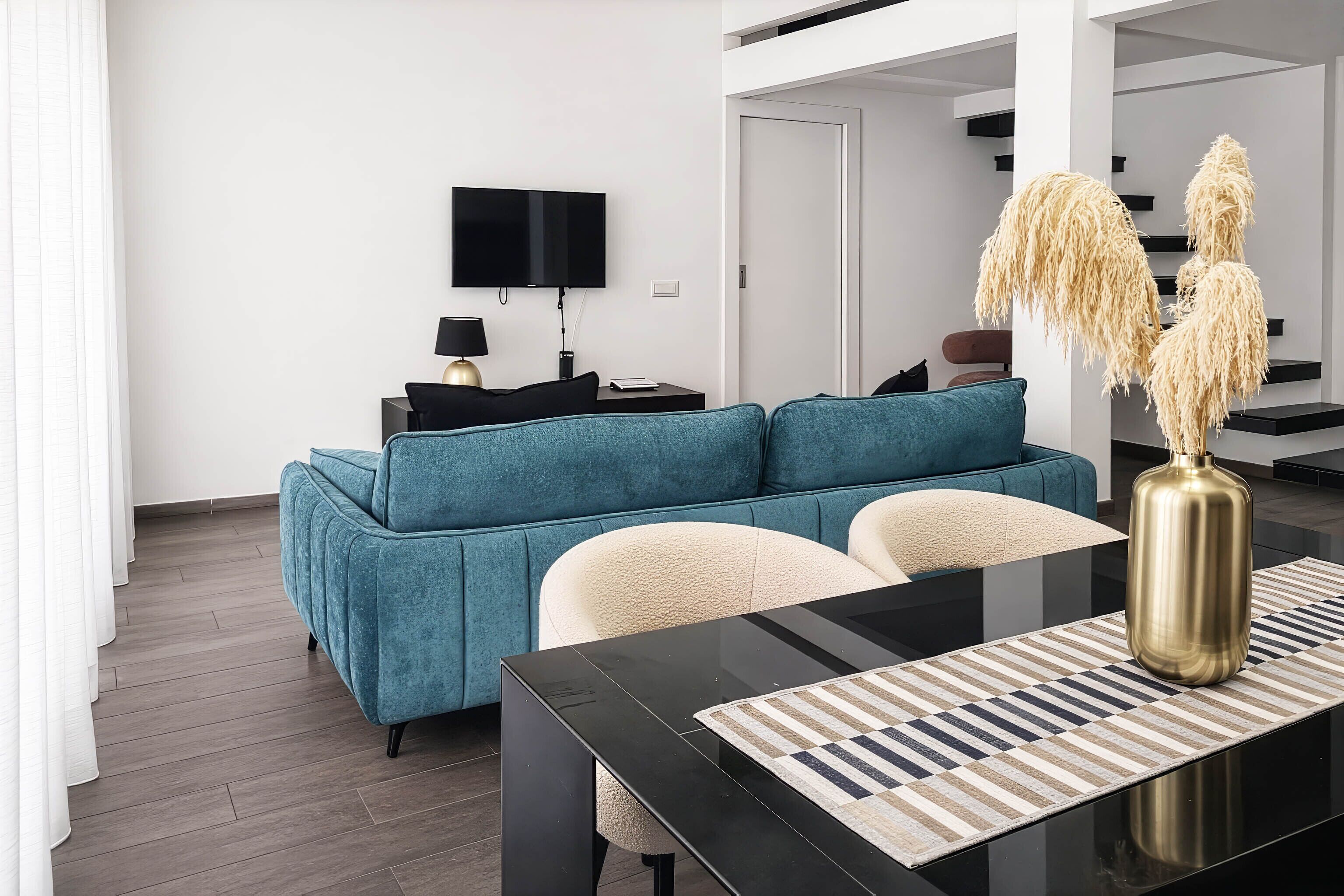 Apartment, 2 Bedrooms, Balcony, City View | Living area | Flat-screen TV